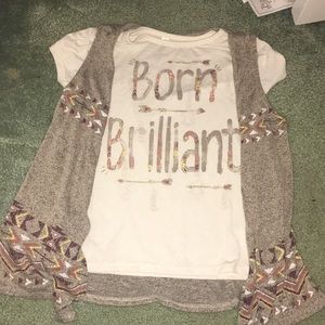 A “Born Brilliant” shirt